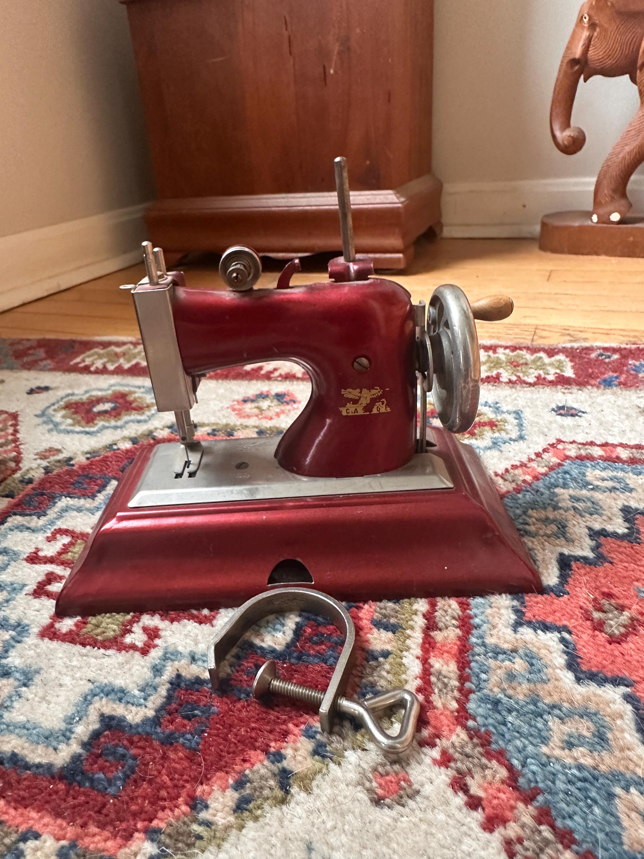 Vintage Casige German Child’s Sewing Machine Hand Crank Red Toy Sewing Machine Display Piece