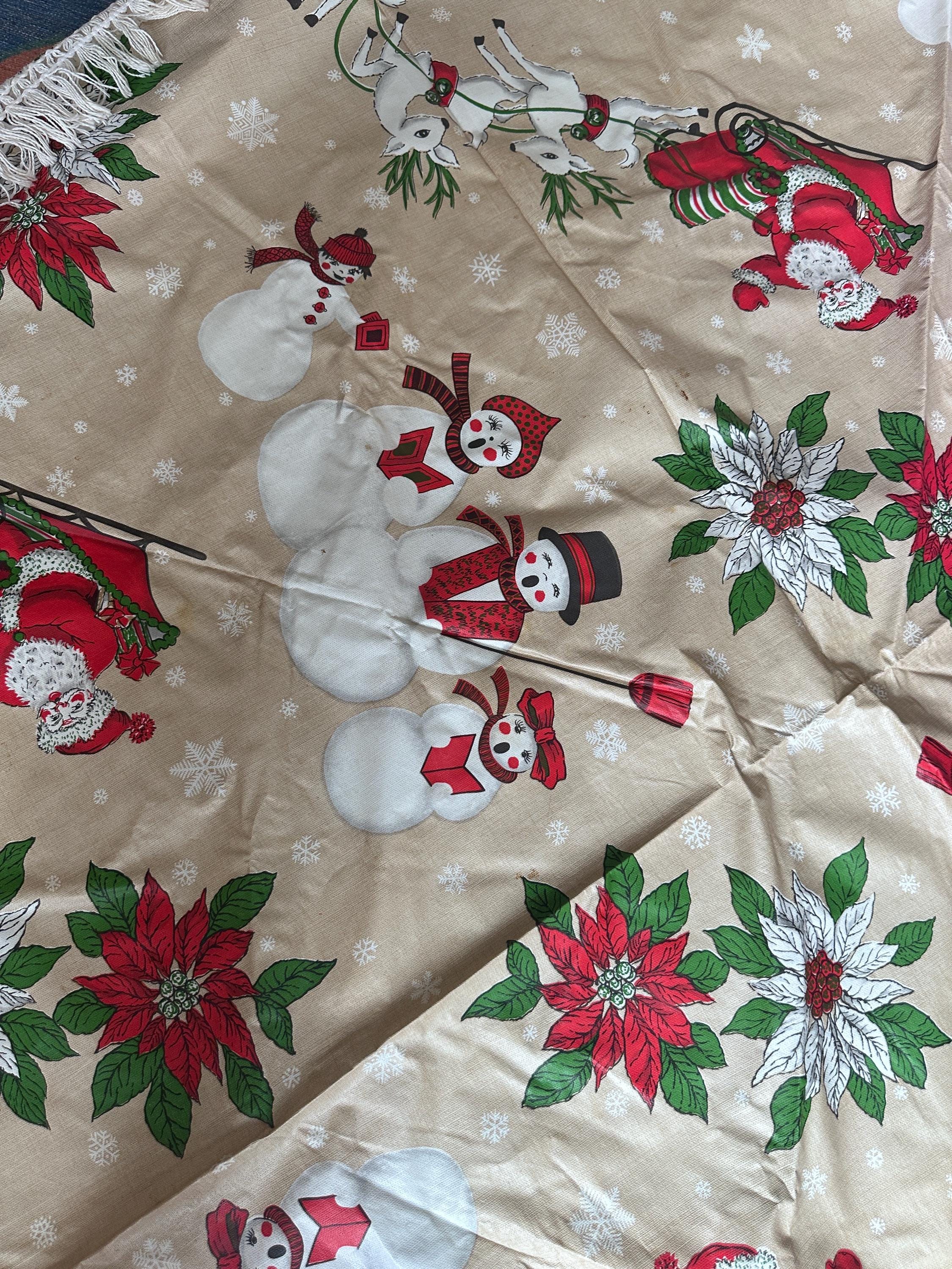 Vintage Kitschy Christmas Round Vinyl Tablecloth | Santa, Snowy Winter & Poinsettia Holiday Print | 60” with White Trim | Retro Holiday Deco